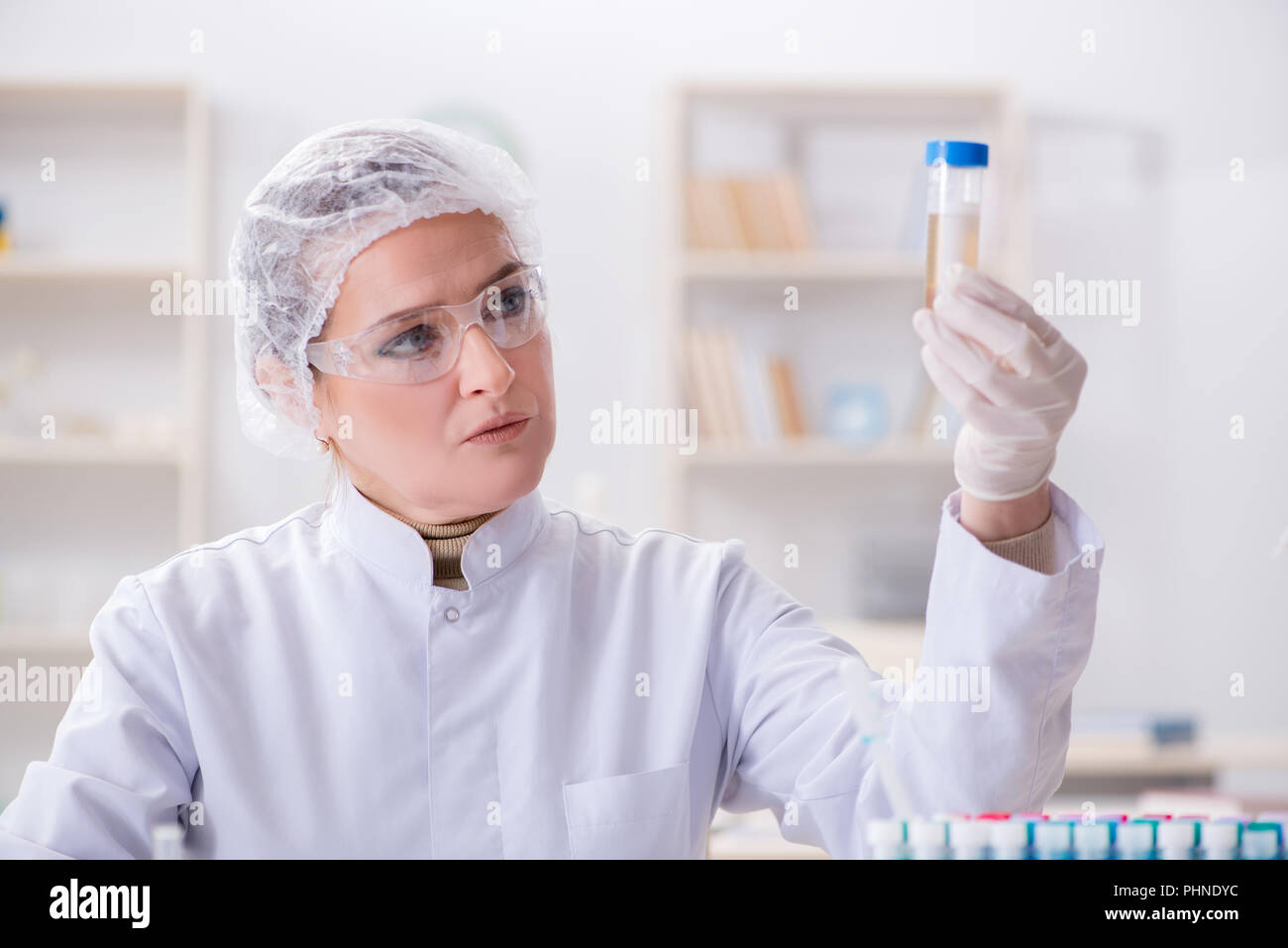 Doctor with test tube in medical hospital lab Stock Photo Alamy