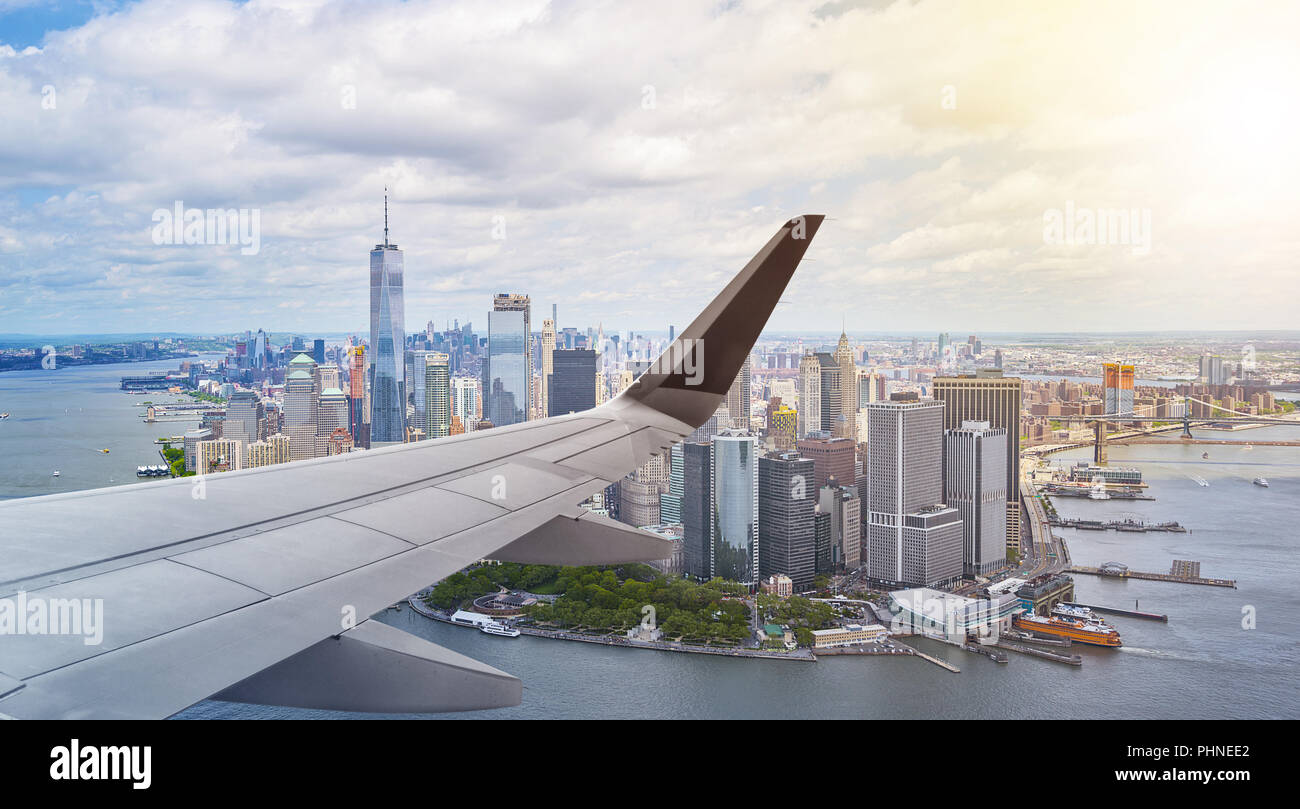 Aerial New York City with airplane wing Stock Photo