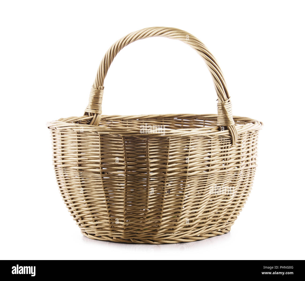 Empty wicker basket isolated on white background. Stock Photo