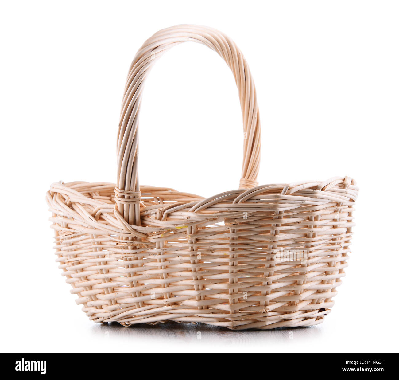 Empty wicker basket isolated on white background Stock Photo - Alamy