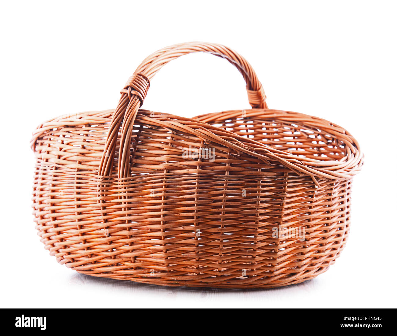 Empty wicker basket isolated on white background Stock Photo - Alamy