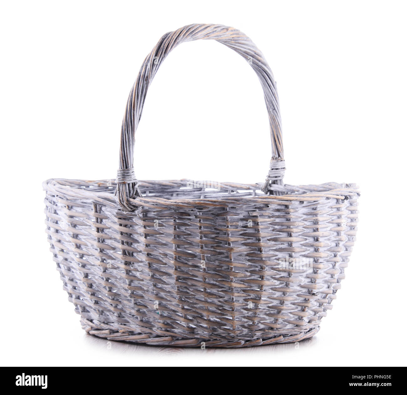 Empty wicker basket isolated on white background Stock Photo - Alamy