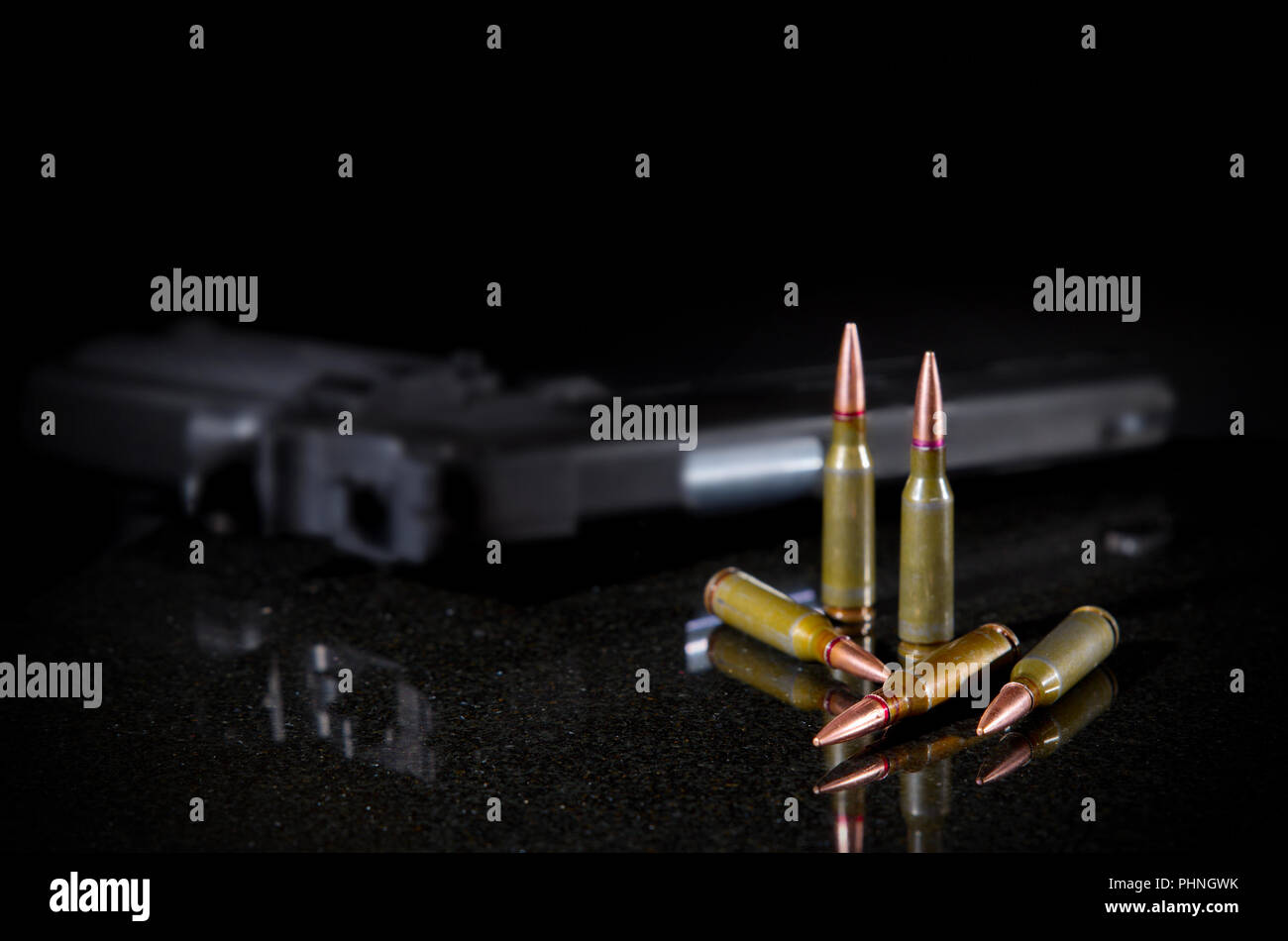 Ammunition cartridges on black background Stock Photo