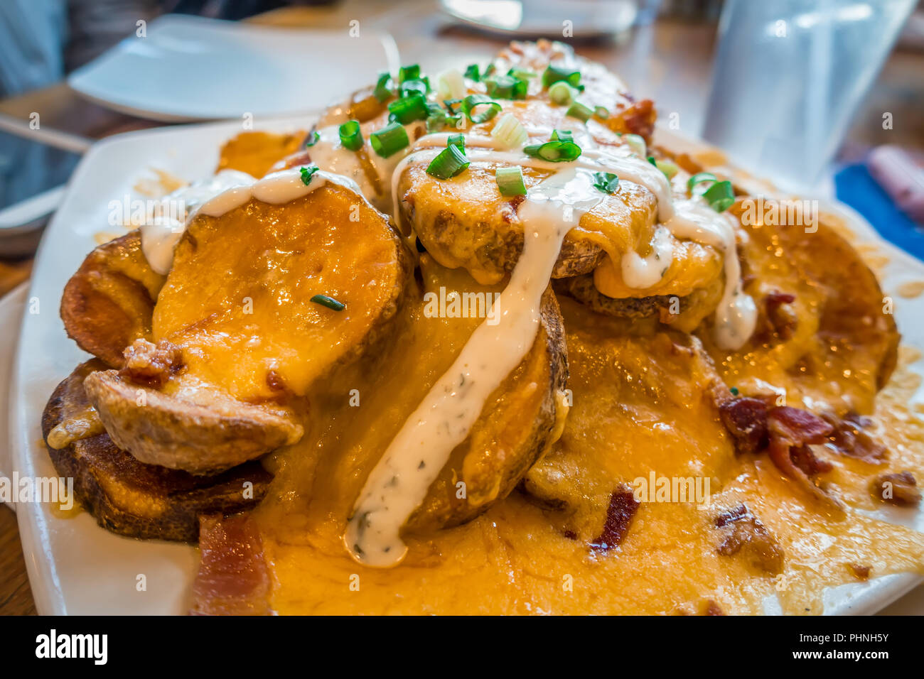 baked potato slices with melted cheese appetizer Stock Photo Alamy