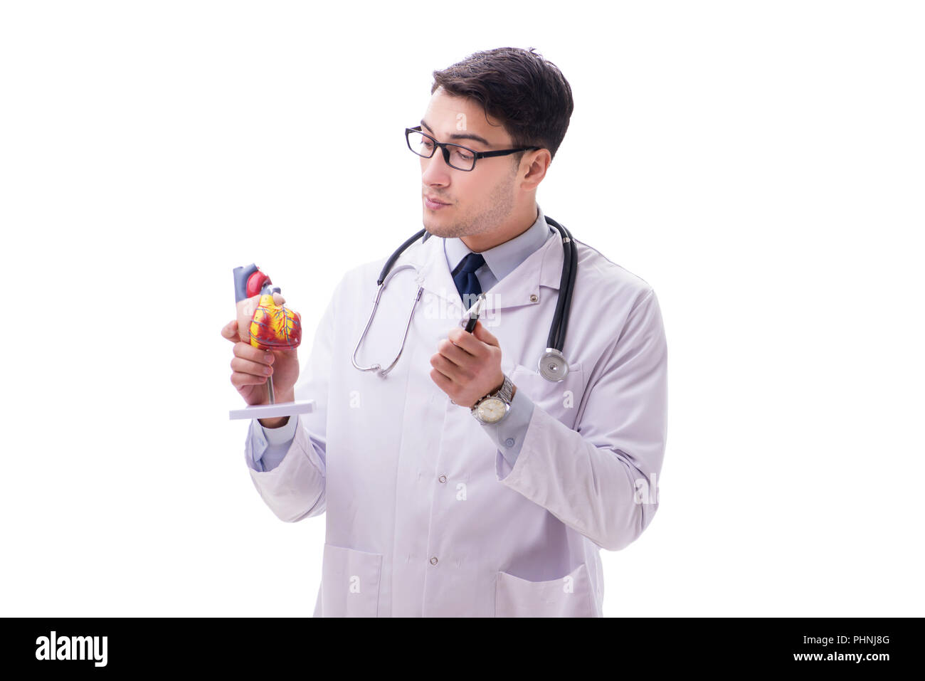 Young doctor with heart shape isolated on white Stock Photo - Alamy
