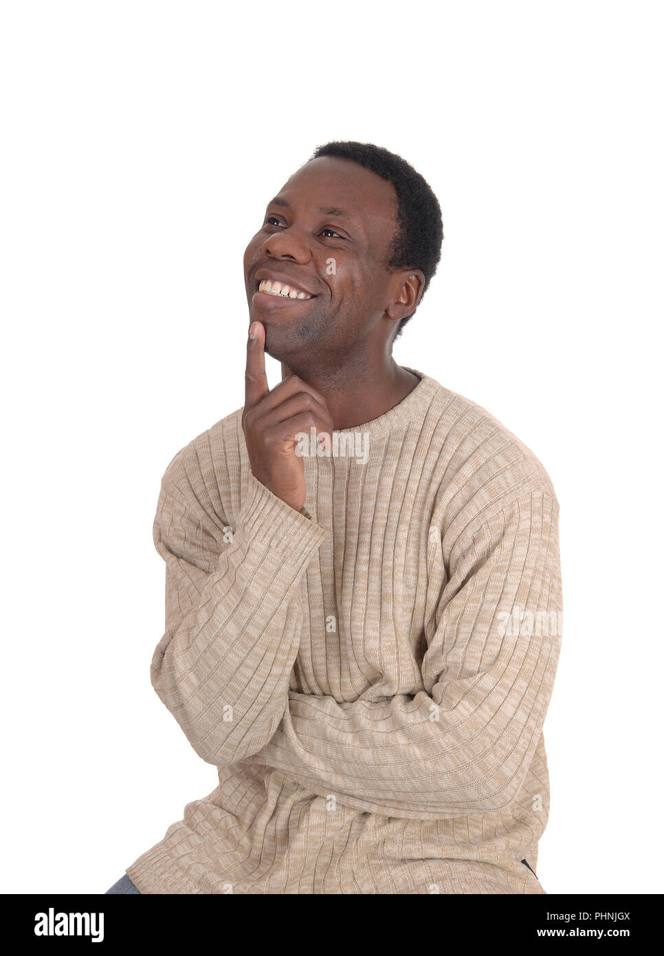 Happy African man with a smiling face looking up Stock Photo