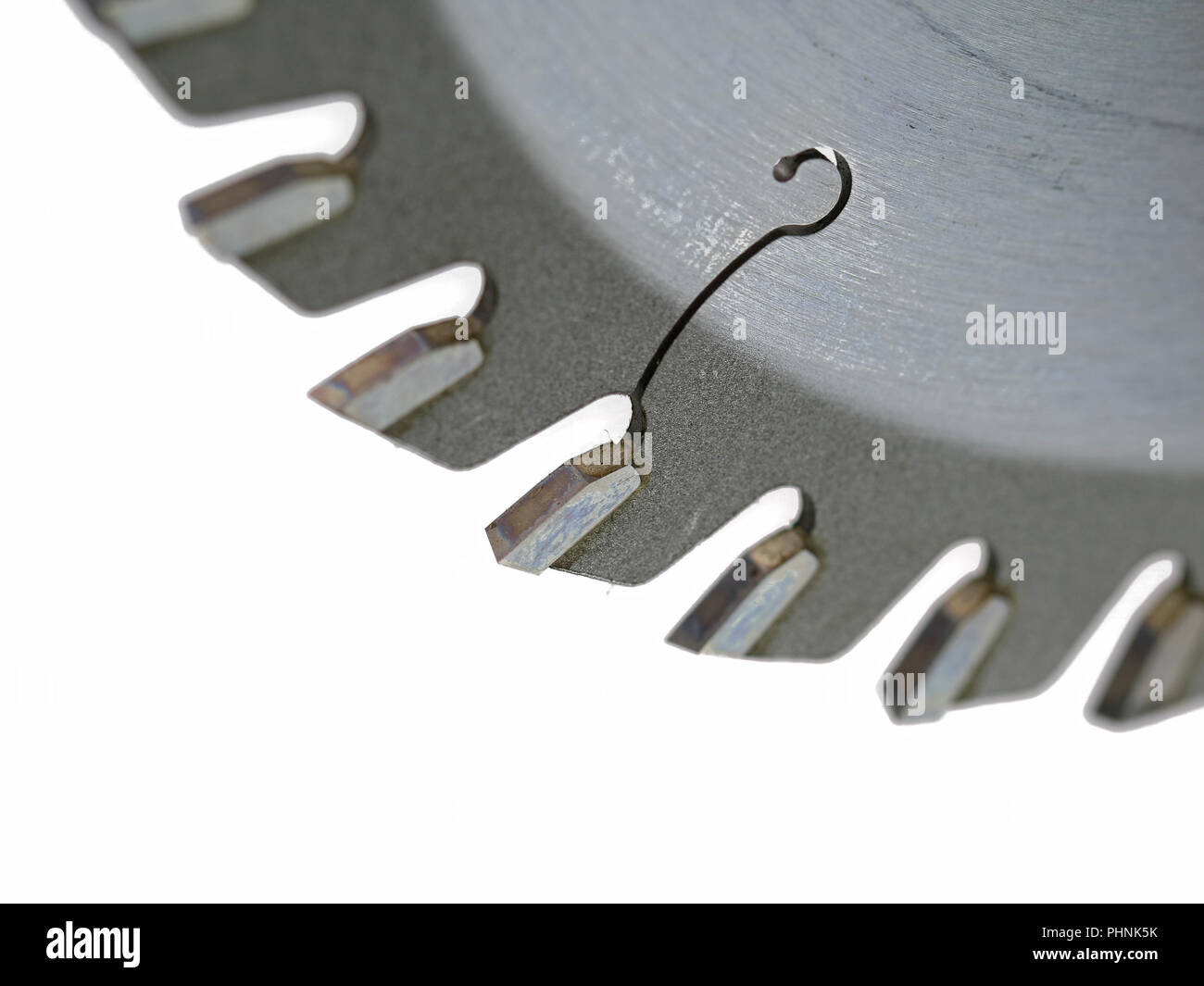 Close up a part of circular saw blade teeth isolated on white