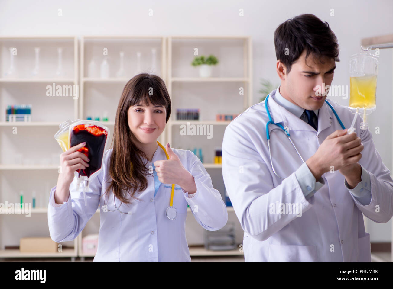 Two doctors discussing plasma and blood transfusion Stock Photo Alamy