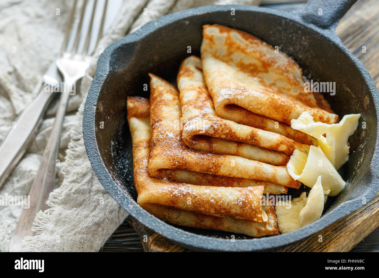 Crepes with butter for breakfast. Stock Photo