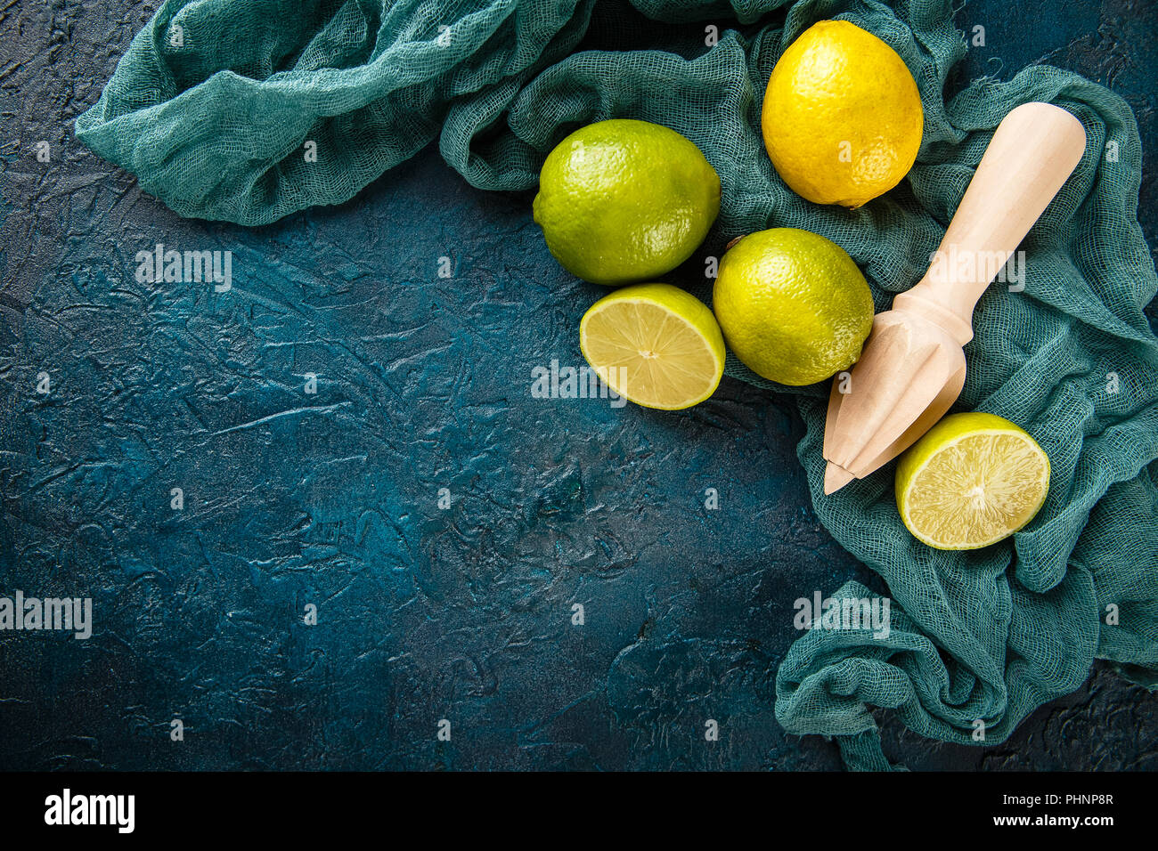 Fresh limes with citrus juicer stick Stock Photo: 217452055 - Alamy