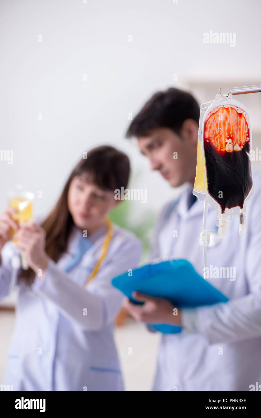Two doctors discussing plasma and blood transfusion Stock Photo Alamy