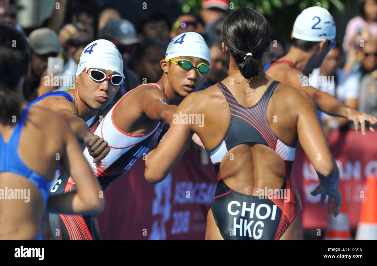 Palembang, Indonesia. 2nd Sep, 2018. Players compete during mixed relay of Triathlon at the 18th Asian Games in Palembang, Indonesia, Sept. 2, 2018. Credit: Veri Sanovri/Xinhua/Alamy Live News Stock Photo
