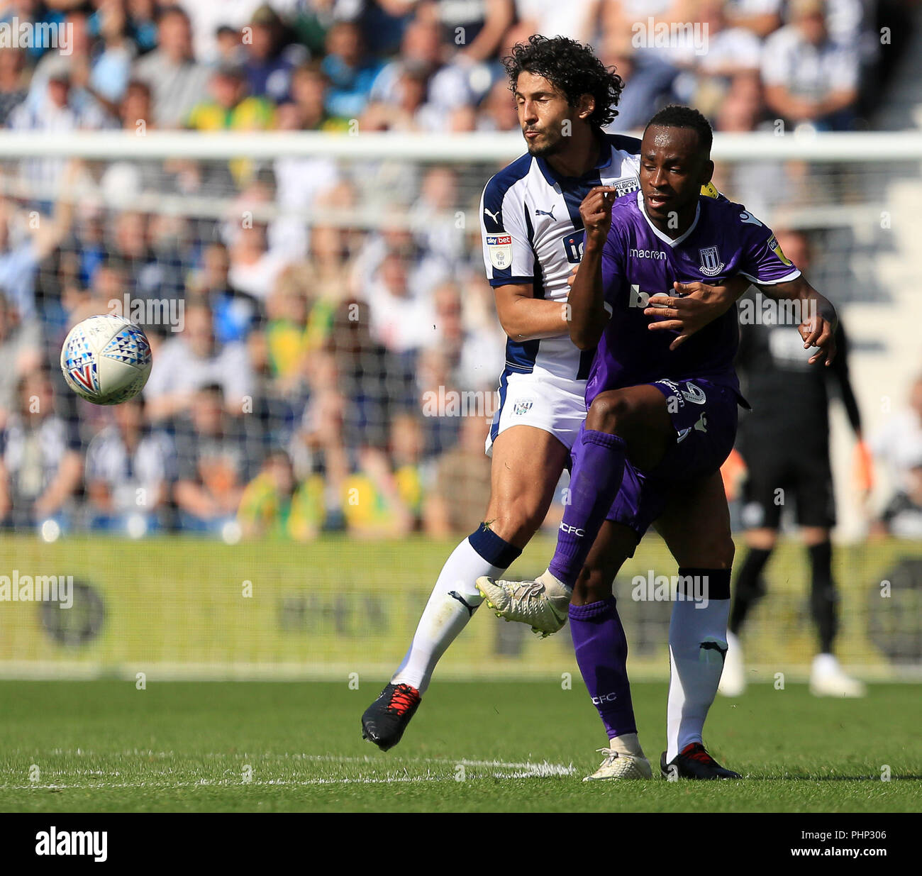 West Bromwich, UK. 1st Sept, 2018. Editorial use only, license required for commercial use. No use in betting, games or a single club/league/player publications. Saido Berahino of Stoke City tustles with Ahmed Hegazy of West Bromwich Albion. Credit:Paul Roberts/One Up Top Credit: Paul Roberts/OneUpTop/Alamy Live News Stock Photo