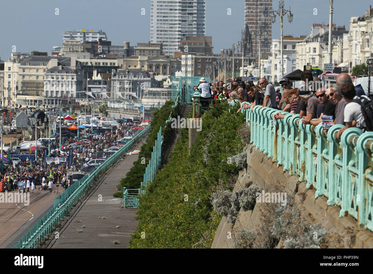 Brighton, UK. 1st September 2018: People watching the National Speed Trials that run along Madeira Drive in Brighton on 1 September 2018.   The Pier, in the central waterfront section, opened in 1899 houses amusement rides as well as food kiosks.Credit: David Mbiyu /Alamy Live News Stock Photo