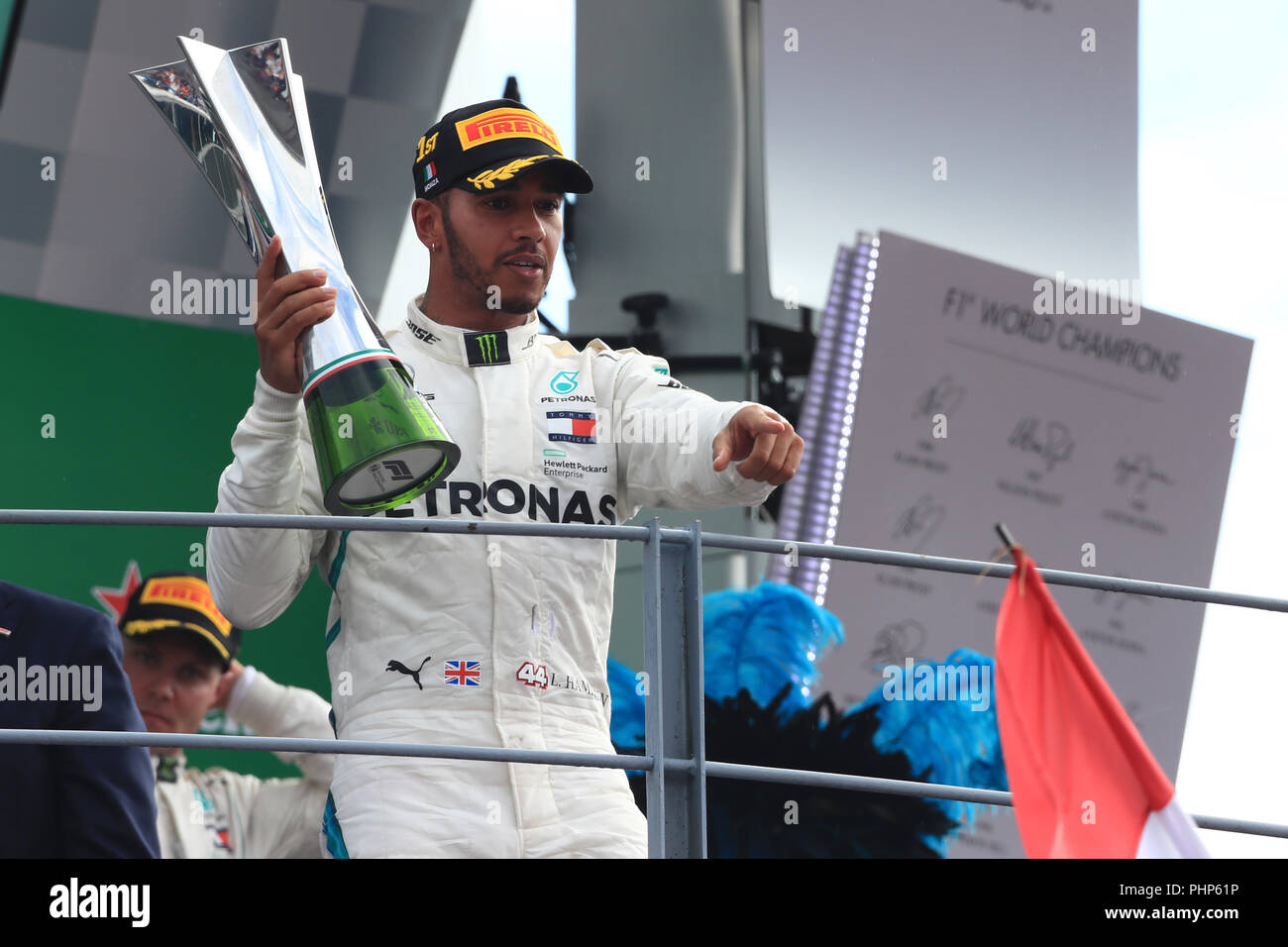 Monza, Italy. 2 September 2018. Formula One Grand Prix of Italy, race day;  Mercedes AMG Petronas Motorsport, Lewis Hamilton holds his trophy on the  podium as he wins the race Credit: Action