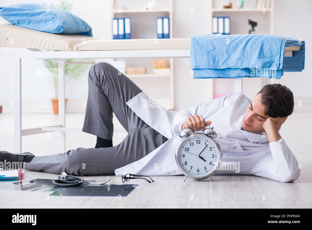 Doctor sleeping on floor hi-res stock photography and images - Alamy