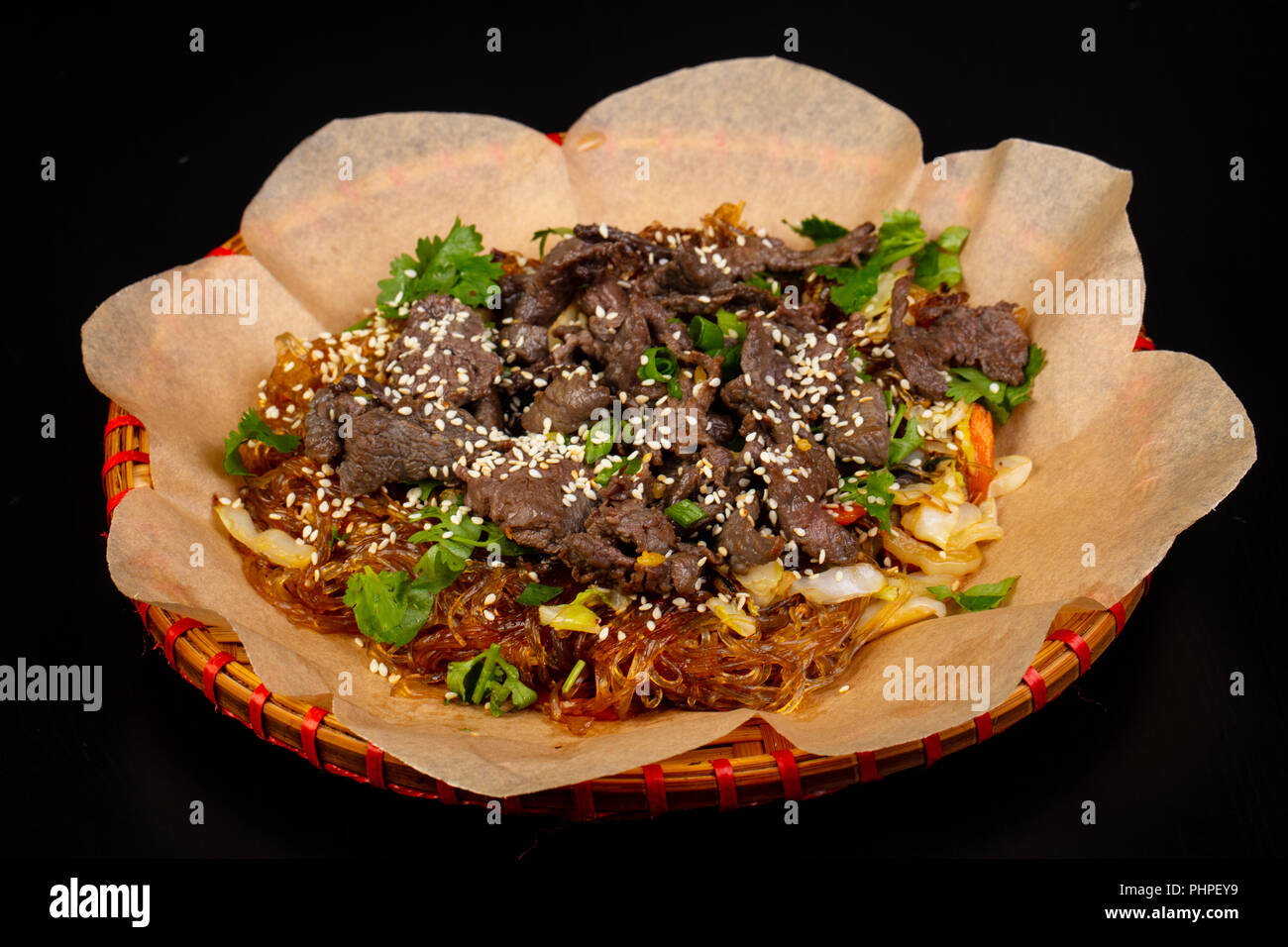 Asian cuisine Fried glass noodle with beef Stock Photo Alamy