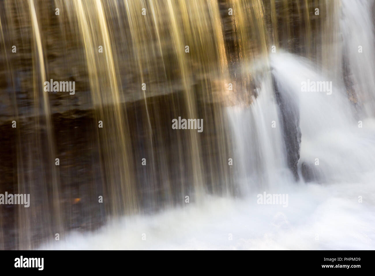 Abstract Gold colored waterfall Stock Photo