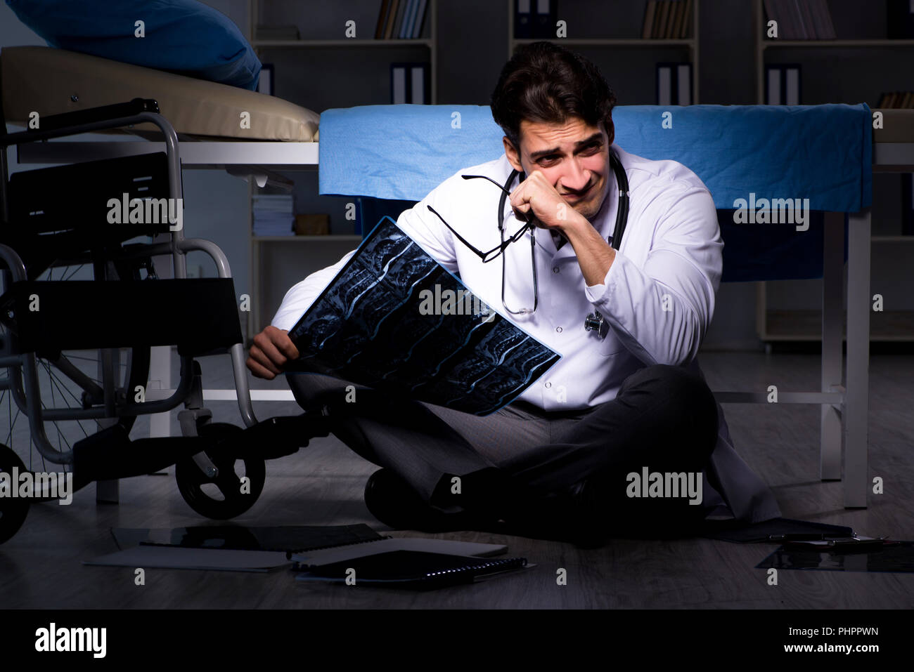 Doctor working night shift in hospital after long hours Stock Photo Alamy