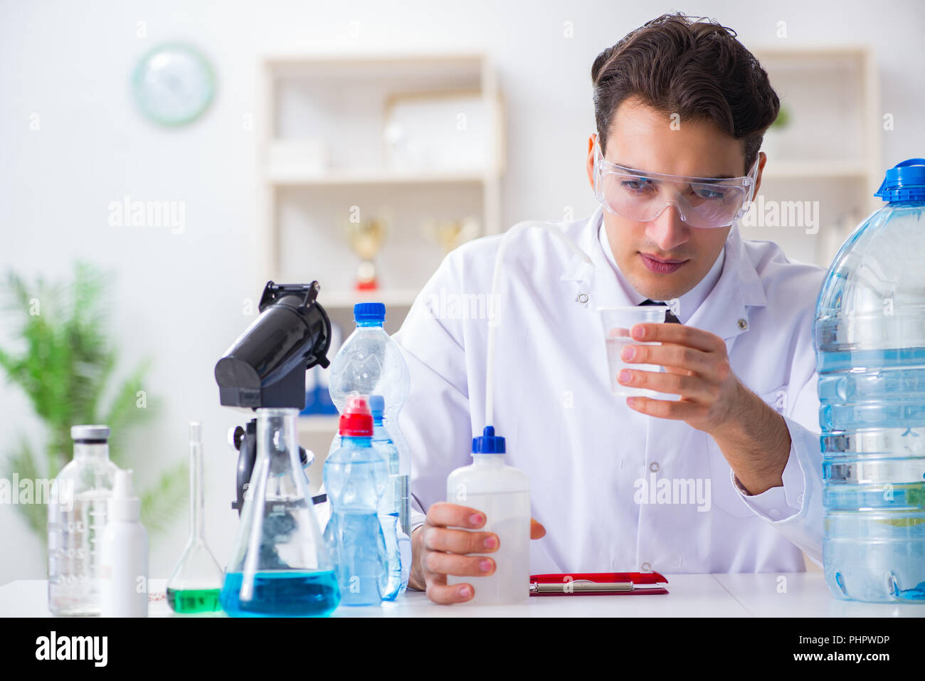Lab assistant testing water quality Stock Photo Alamy