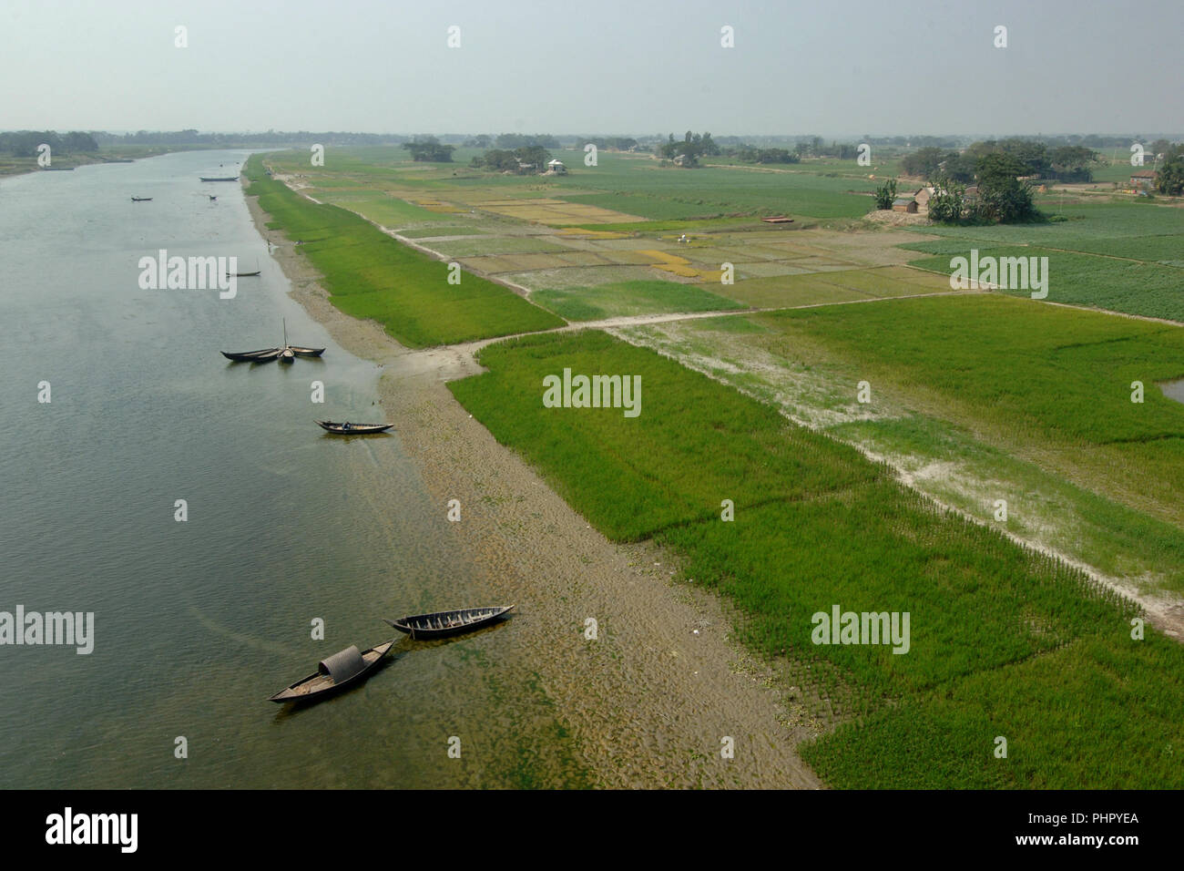 Munshiganj, Bangladesh - February 03, 2009: The Dhaleshwari River is embracing a slow death due to lack of dredging and/or as a consequence of human e Stock Photo
