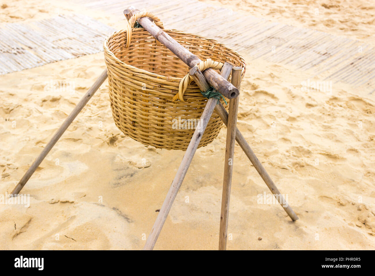 Woven Basket on Frame Sandy Beach Stock Photo