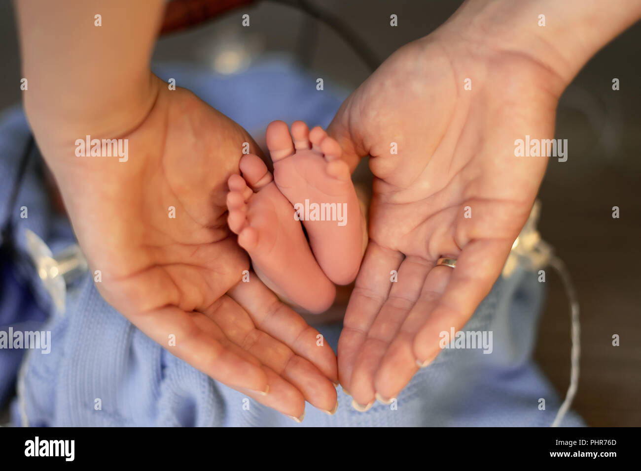 Newborn's Little Hand On The Mother's Palm Stock Photo, Picture and Royalty  Free Image. Image 90861508.