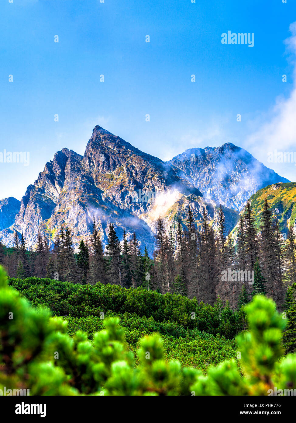 Polish Tatra mountains summer landscape with blue sky and white clouds. Stock Photo