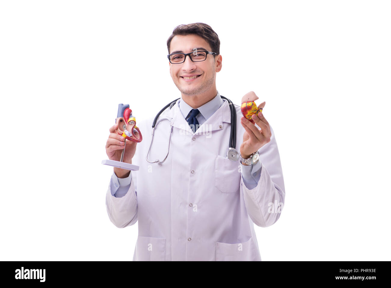 Young doctor with heart shape isolated on white Stock Photo - Alamy