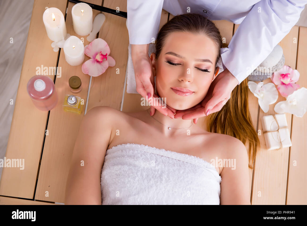 Young woman during spa procedure in salon Stock Photo Alamy