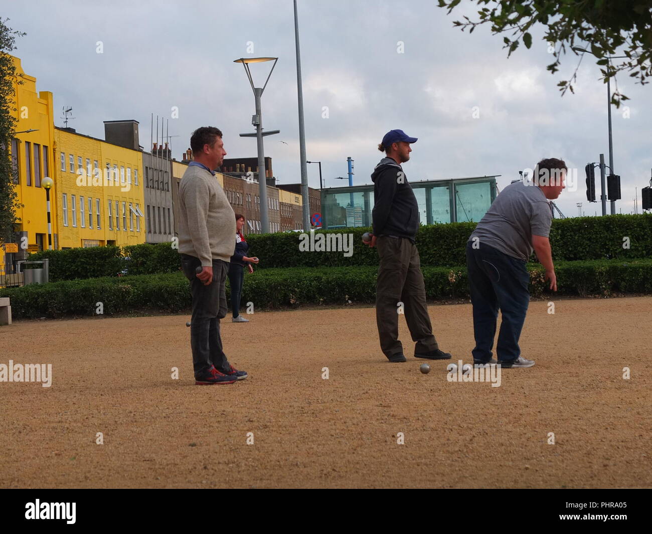 Members of the Liberation Petanque Club playing petanque on a public pitch at Weighbridge Gardens St Helier Jersey Channel Islands Stock Photo