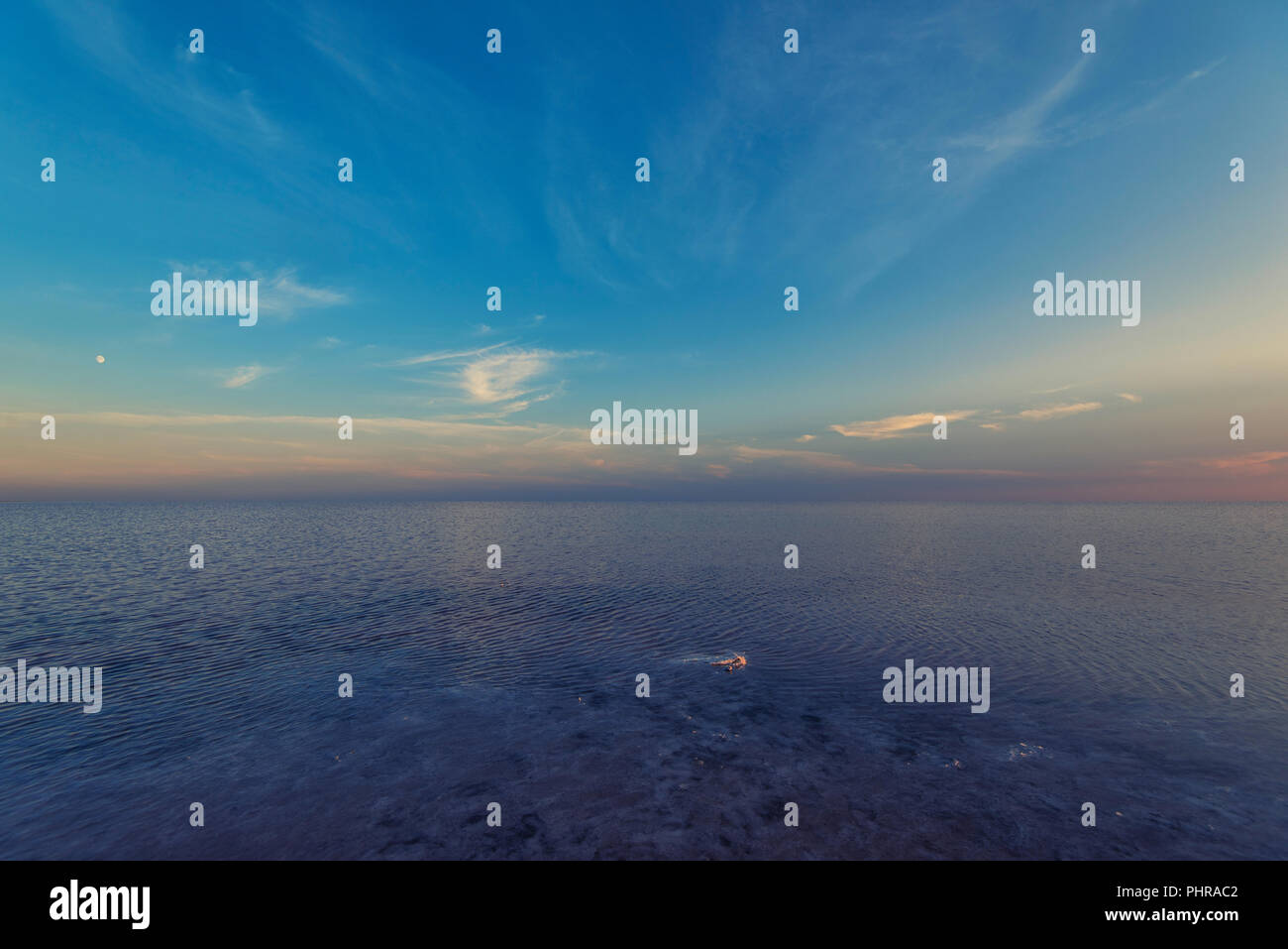 Beauty sunset on salty lake Stock Photo - Alamy