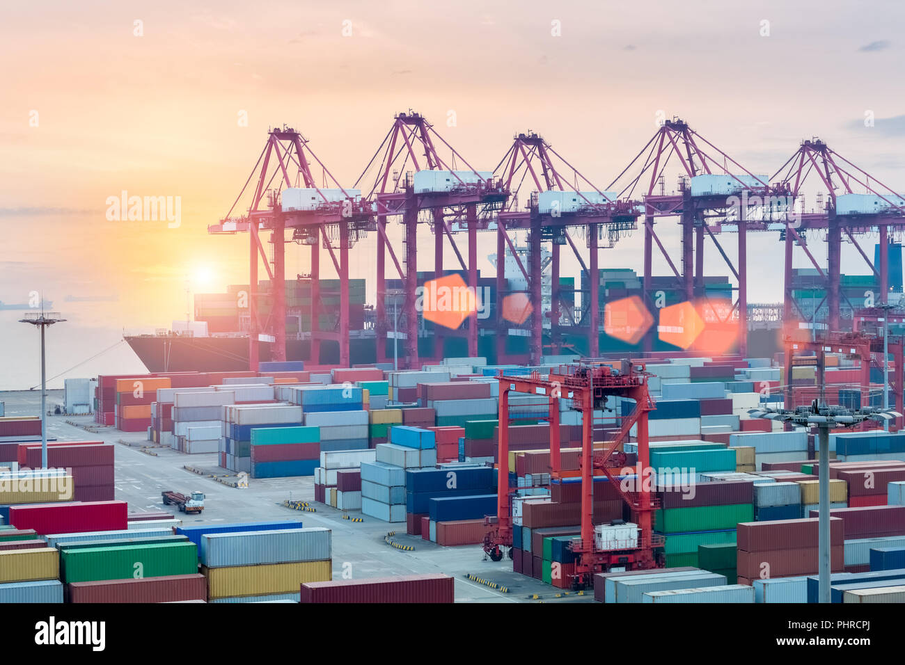 container terminal closeup in sunset Stock Photo
