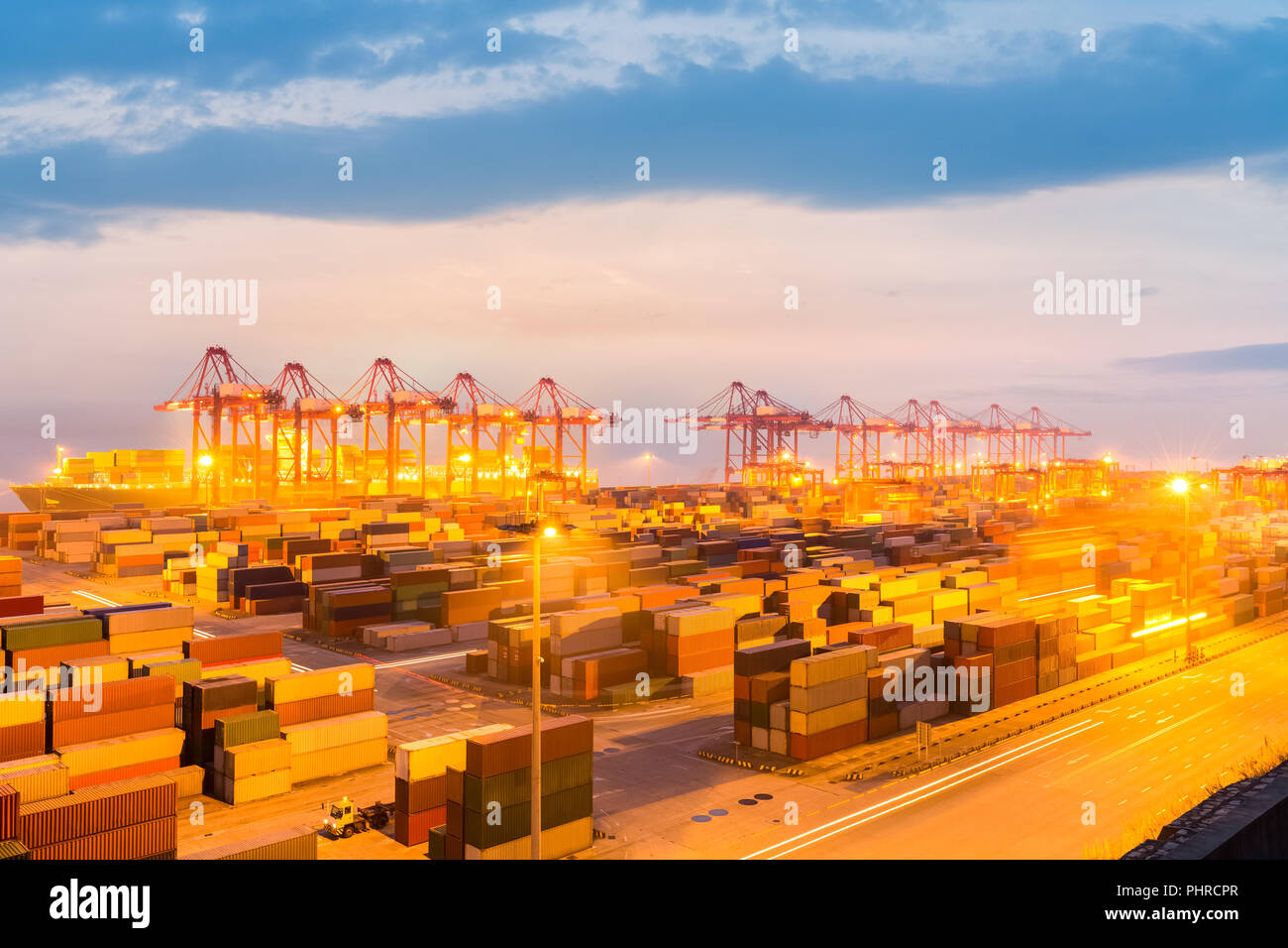modern container terminal in nightfall Stock Photo