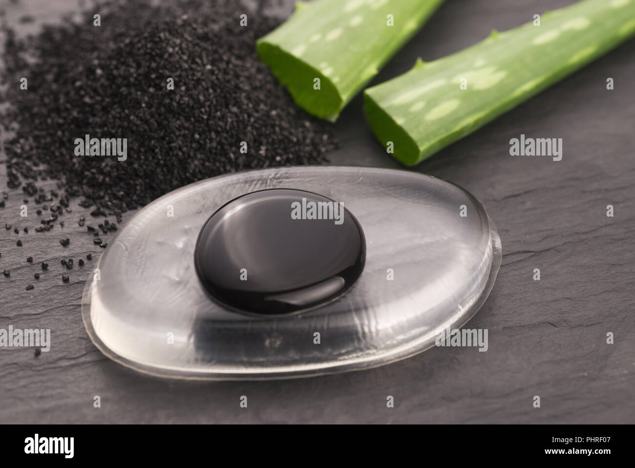 black charcoal mask with aloe vera Stock Photo Alamy