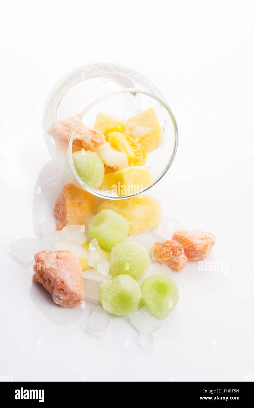 frozen exotic fruits on white background Stock Photo Alamy