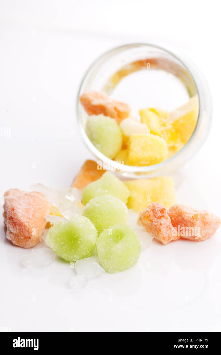 frozen exotic fruits on white background Stock Photo Alamy