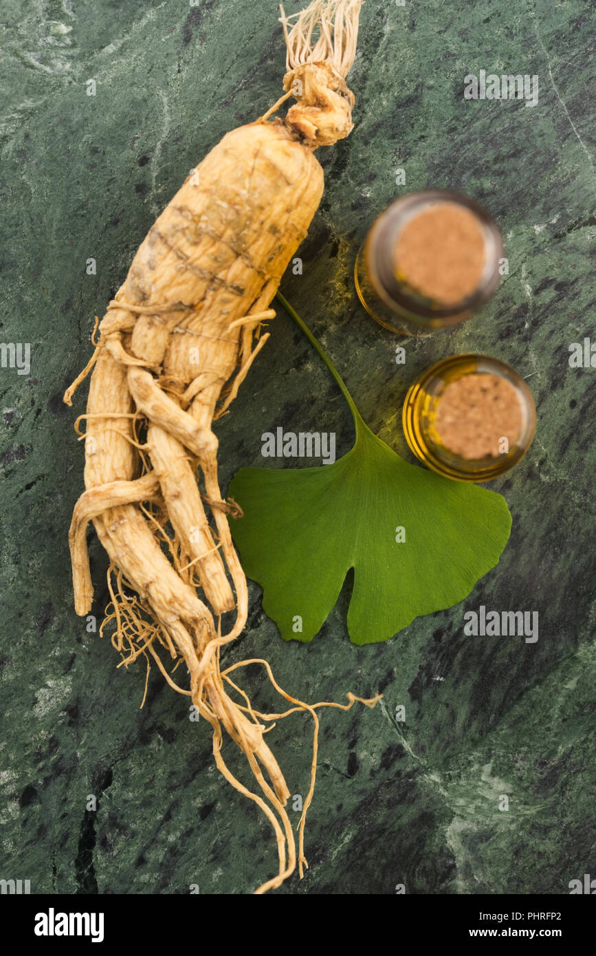 Extract of ginseng root and ginkgo biloba leaves Stock Photo Alamy