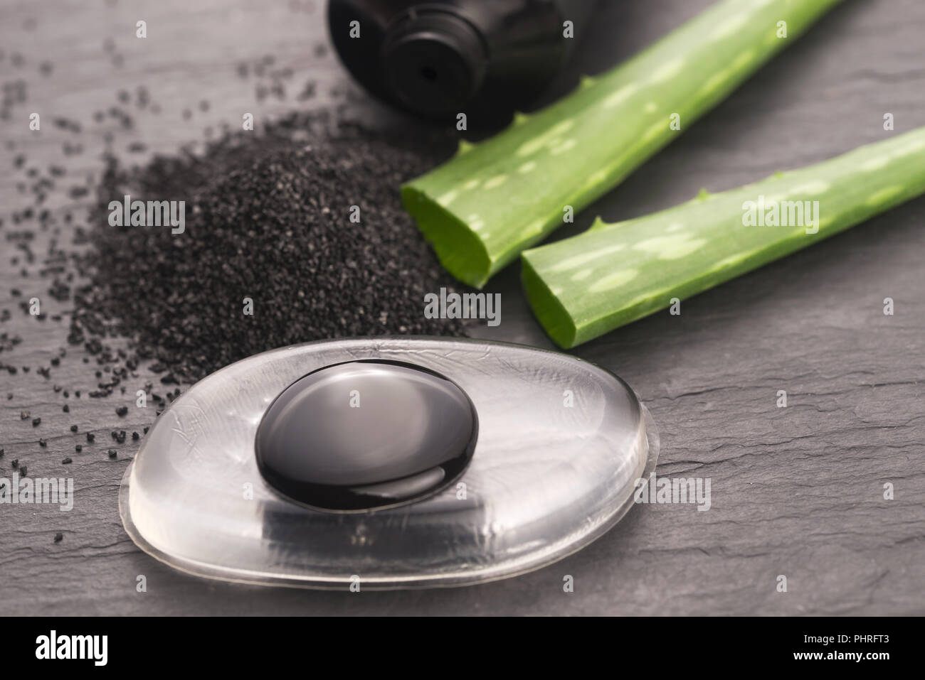 black charcoal mask with aloe vera Stock Photo Alamy