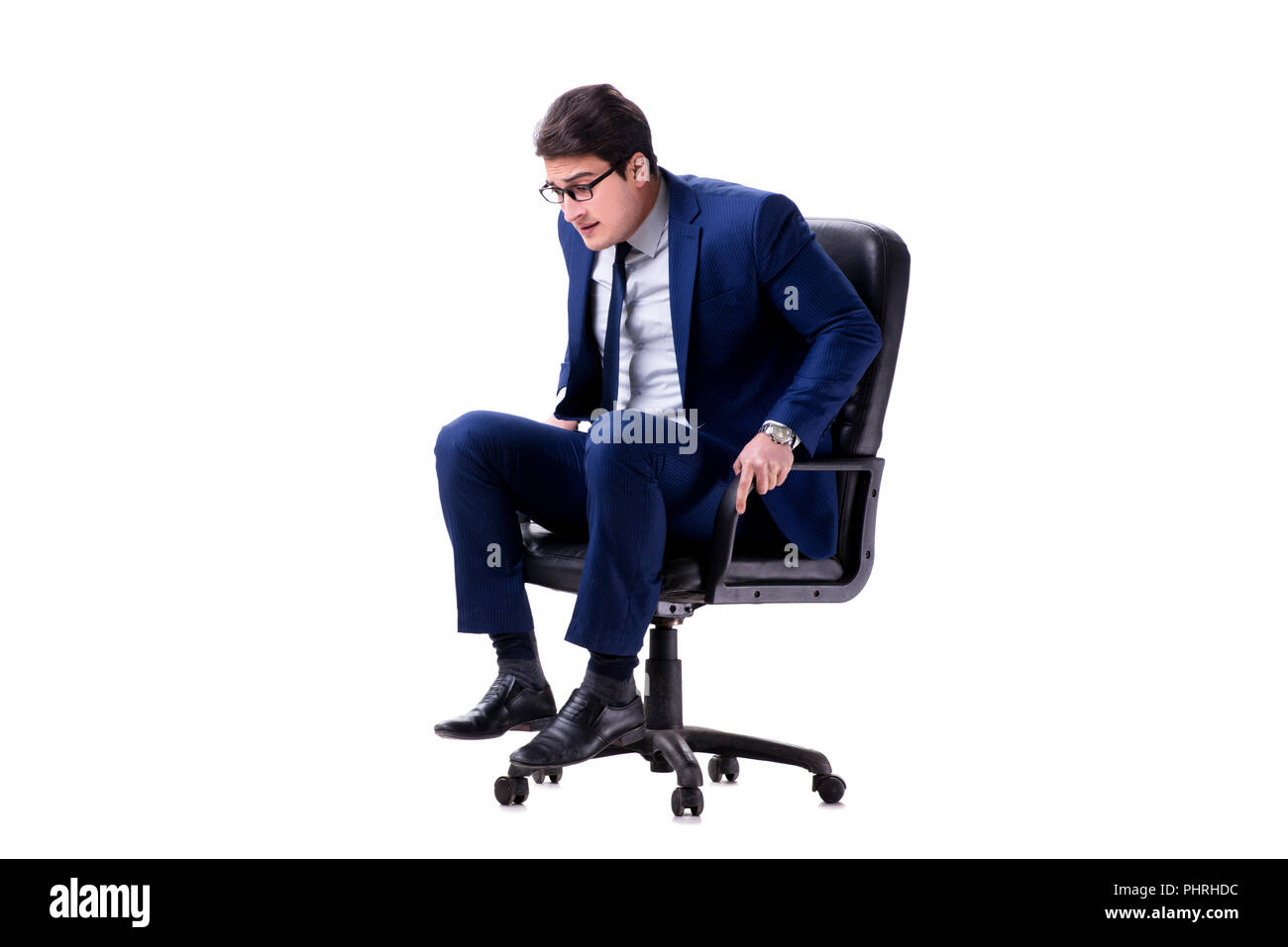 Businessman sitting on office chair isolated on white Stock Photo - Alamy