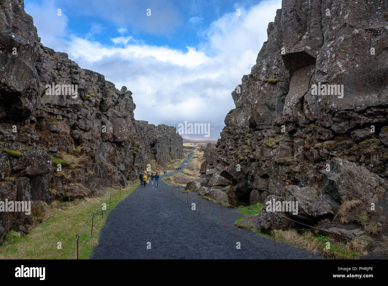 The walking path through the rift zone in Thingvellir National Park ...