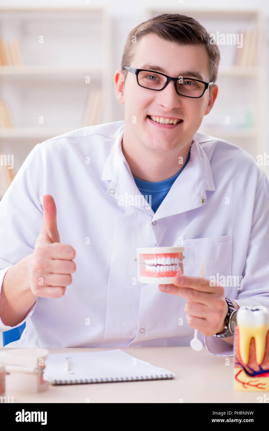 Dentist working teeth implant in medical lab Stock Photo Alamy