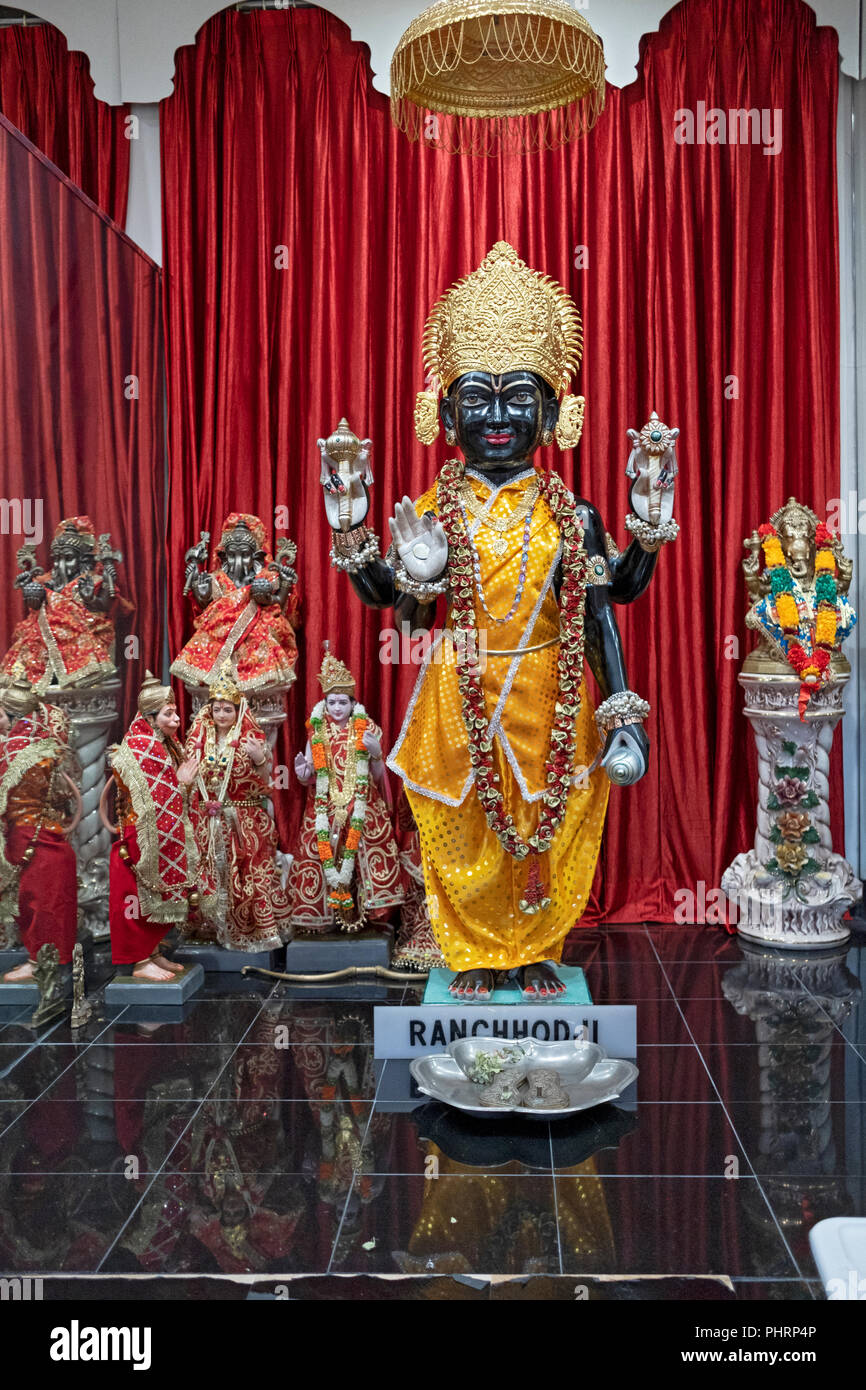 A statue of deity Ranchhod - another name for Krishna - at the altar inside the Geeta Temple in Corona, Queens, New York City Stock Photo