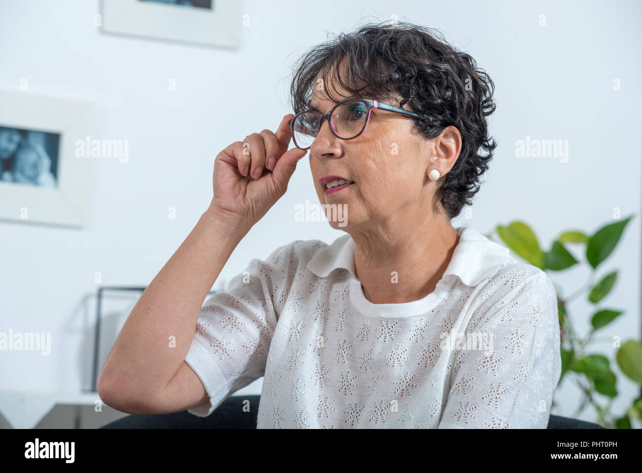 portrait of a beautiful mature brunette with glasses Stock Photo - Alamy