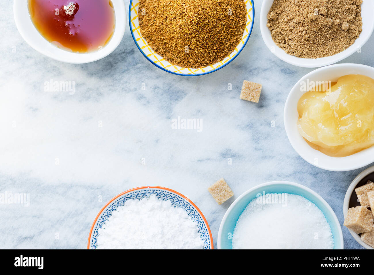 Different Kinds of Sugar and Sweeteners in the Bowls, such as coconut