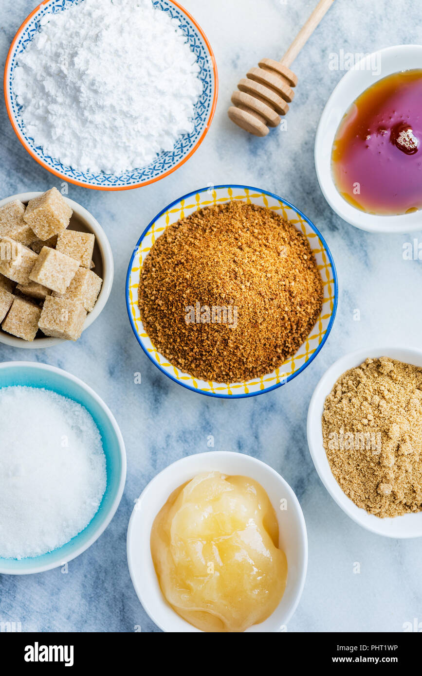 Different Kinds of Sugar and Sweeteners in the Bowls, such as coconut