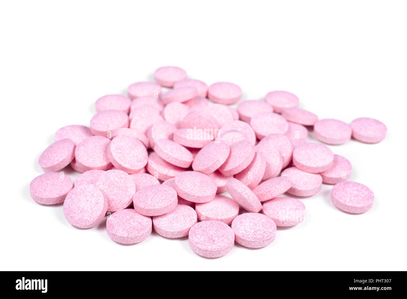 Pink tablet pills on white Stock Photo Alamy