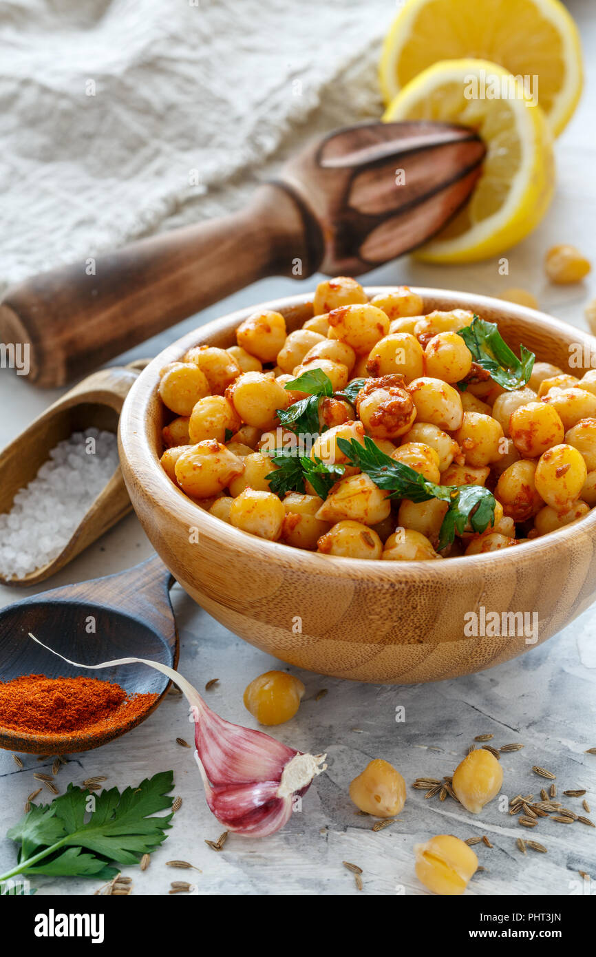 Bowl with spicy chickpeas. Stock Photo