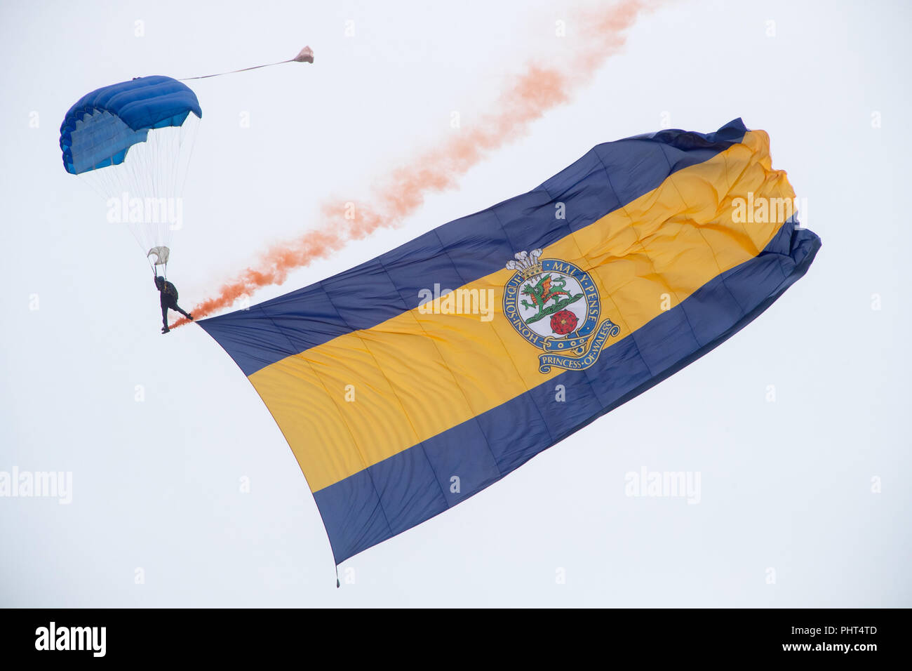 The Tigers parachute display team at Bournemouth Air Festival carrying their The Princess of Wales's Royal Regiment flag Stock Photo