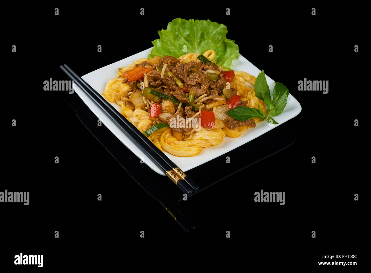 Vietnamese dish Pho Xao Bo is a stirfried rice noodles with beef Stock